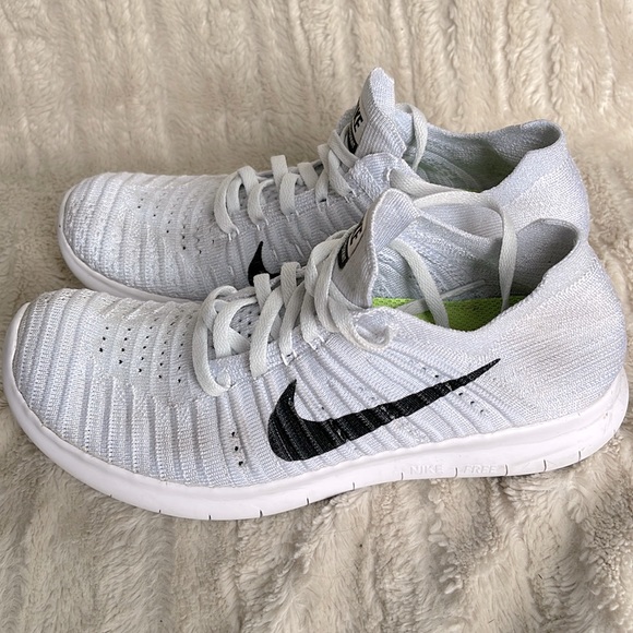 Nike Shoes - Nike Free RN Flyknit white sneakers women’s size 7.5 good used condition